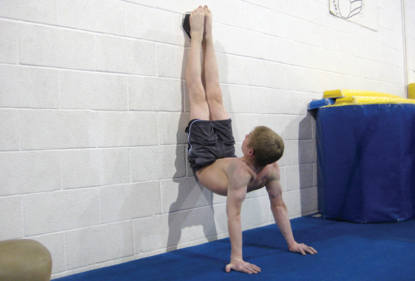 Weighted Shoulder Extension Hang 4 Manna Wall Slide