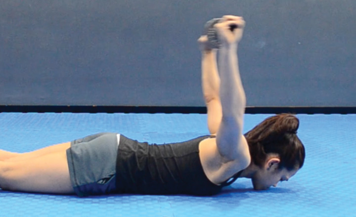 Prone Over Grip Weighted Shoulder Dislocate Beginning