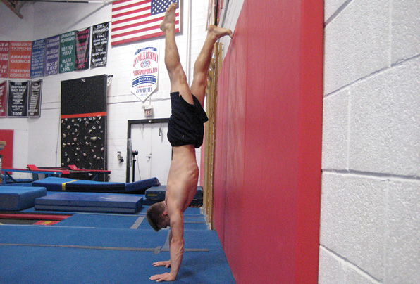Forearm Plank Posterior Pelvic Tilt 5 Partial Wall Handstand Rep