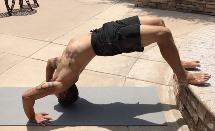 Elevated Thoracic Bridge Push-Up Beginning