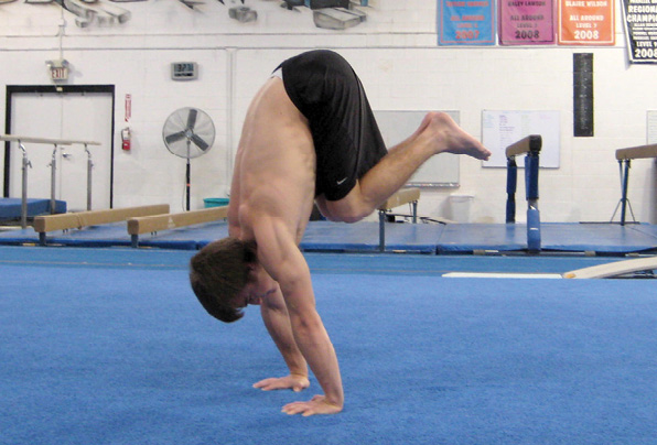 Standing Tuck Press Handstand