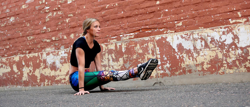 GymnasticBodies athlete shows how to L-sit for abs.