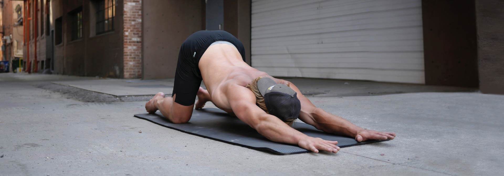 GymnasticBodies cat stretch for combatting the negative effects of sitting.