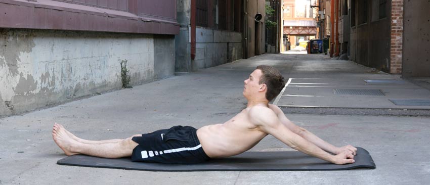 Seated shoulder extension stretch for mobility