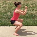 Christopher Sommer's athlete demonstrates hip, knee, and ankle mobility with a bodyweight squat.