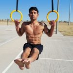 GymnasticBodies athlete demonstrates how to do an L-sit Pull-up.