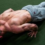 GymnasticBodies athlete demonstrates upper control and strength with a pseudo planche push-up.