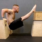 GymnasticBodies athlete prepares for muscle-ups