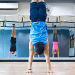 GymnasticBodies athletes show off their handstand control.